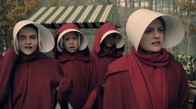 The Handmaid's Tale -- "Faithful" -- Episode 105 -- Serena Joy makes Offred a surprising proposition. Offred remembers the unconventional beginnings of her relationship with her husband. Janine (Madeline Brewer), left and Offred (Elisabeth Moss), right, shown. (Photo by: George Kraychyk/Hulu)